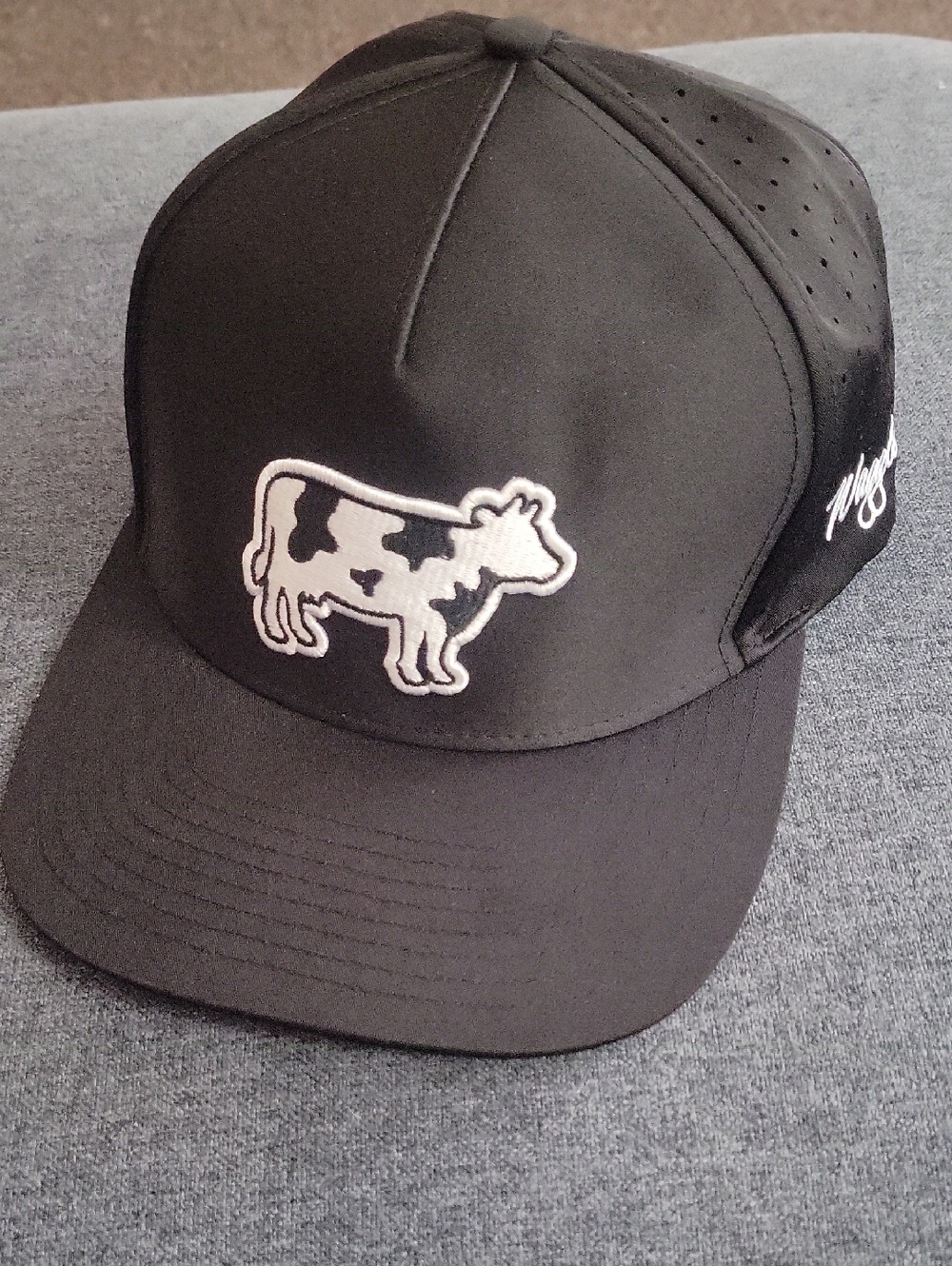 Waggle Black Trucker Hat with Cow Patch